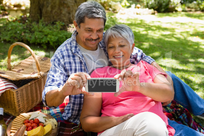 Senior couple taking a selfie