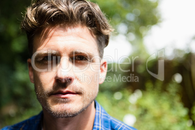 Portrait of man in garden