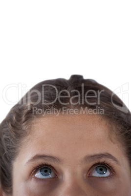 Girls eye and nose against white background