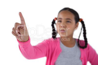 Girl pressing an invisible virtual screen