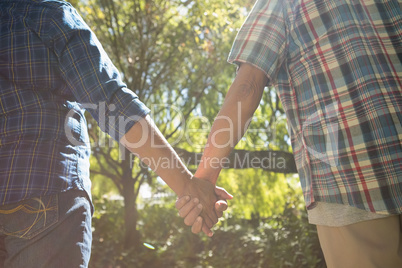 Senior couple holding hands