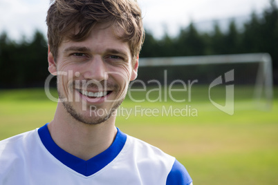 Portrait of smiling male soccer player