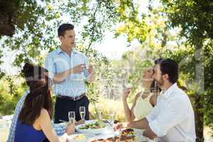 Group of friends toasting champagne glasses