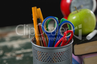 Pencils and scissors in holder