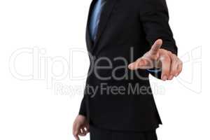 Mid section of businessman in suit using invisible interface