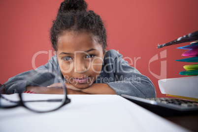 Close up portrait of thoughtful businesswoman looking at eyeglasses