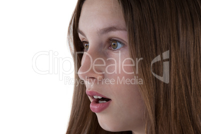 Surprised teenage girl against white background Surprised teenage girl against white background