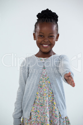 Cheerful businesswoman offering handshake