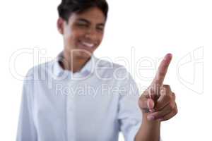 Boy pressing an invisible virtual screen