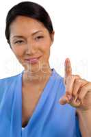 Close up of happy businesswoman touching interface