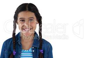 Smiling cute girl standing against white background