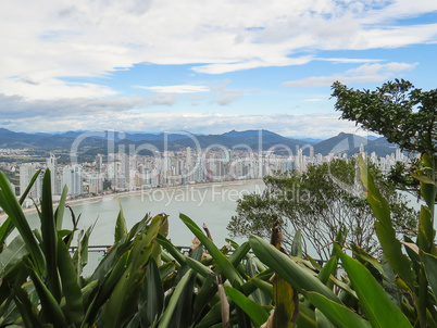 Panoramic view of city by the sea, in sunny day