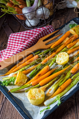 caramelised carrots, spring onions and baked potatoes