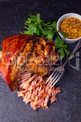 fresh roasted knuckle of pork with mustard