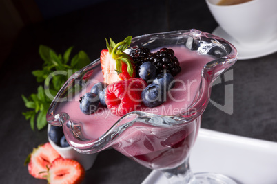 delicious pudding with wild berry