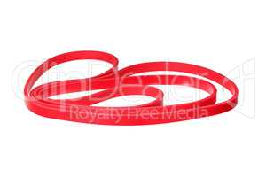 Twisted red rubber wrist band isolated on white.