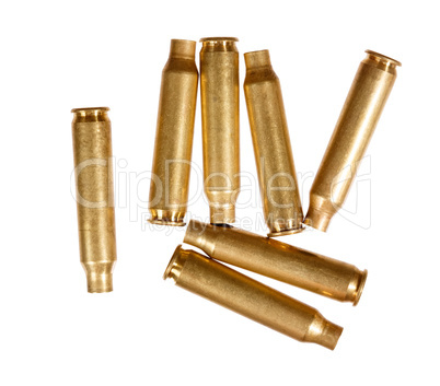 Used rifle cartridges isolated on white.