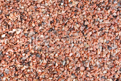 Close-up photo of red sand texture.