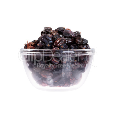 White background with saucepan of raisins.