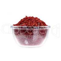 Saucepan with dried barberries on white background.