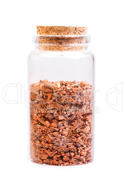 Root of Rubia Tinctorum in a bottle with cork stopper for medica