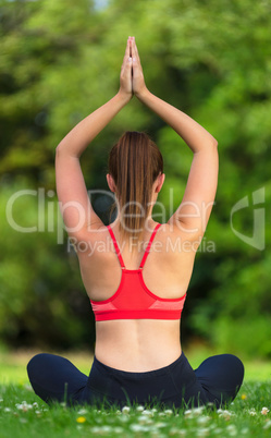 Female Young Fit Healthy Woman or Girl Practicing Yoga Outside