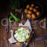 fresh cucumber salad with yogurt and young potatoes