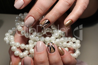 Design of youth manicure with pearls