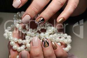 Design of youth manicure with pearls