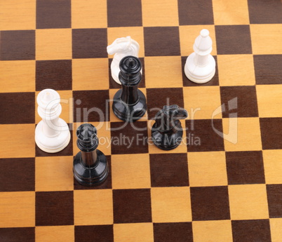 wooden checkerboard with figures