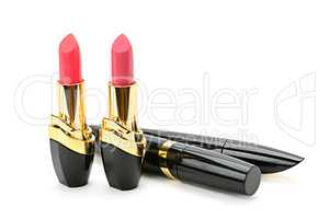 Lipstick and mascara isolated on white