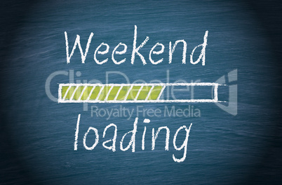 Weekend loading, blue chalkboard with text