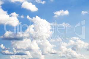 Fluffy Clouds In The Blue Sky