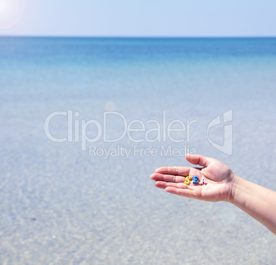 Female hand holds a wooden letter