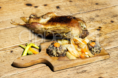 Roasted Duck On Wooden Table