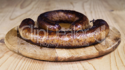 Fried Sausages On a Wooden Board