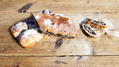 Strudel with poppy seeds on a Wooden Table