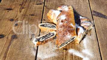 Strudel with poppy seeds on a Wooden Table