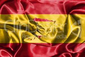 Spanish National Flag Waving In The Wind With Map Of Spain On It