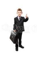 Businessman child boy holding briefcase gesturing thumb up succe