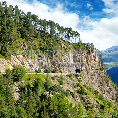 Mountains of Pyrenees, high-altitude road and tunnel.