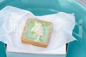 Green Keylime tart pastry with a cookie crust and white chocolat