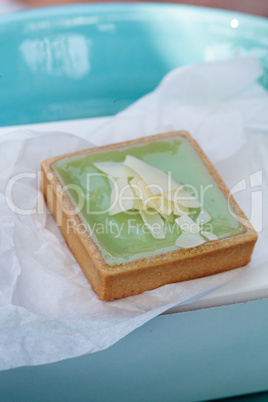 Green Keylime tart pastry with a cookie crust and white chocolat