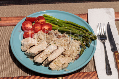 Sauteed pork and asparagus with mushroom risotto