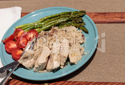 Sauteed pork and asparagus with mushroom risotto