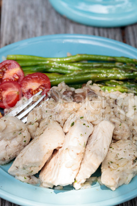 Sauteed pork and asparagus with mushroom risotto