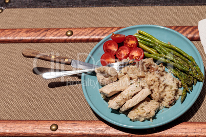 Sauteed pork and asparagus with mushroom risotto