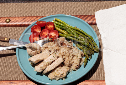 Sauteed pork and asparagus with mushroom risotto