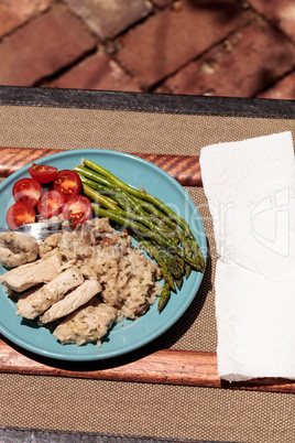 Sauteed pork and asparagus with mushroom risotto