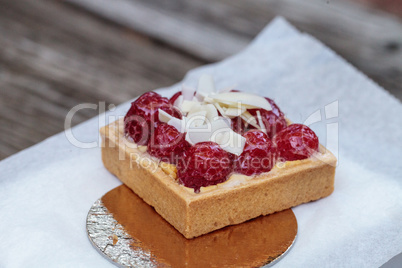 Red raspberry tart pastry with a cookie crust and white chocolat